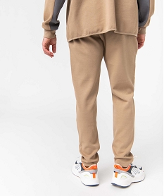 pantalon homme en maille a poches zippees et taille elastiquee beigeD342601_3
