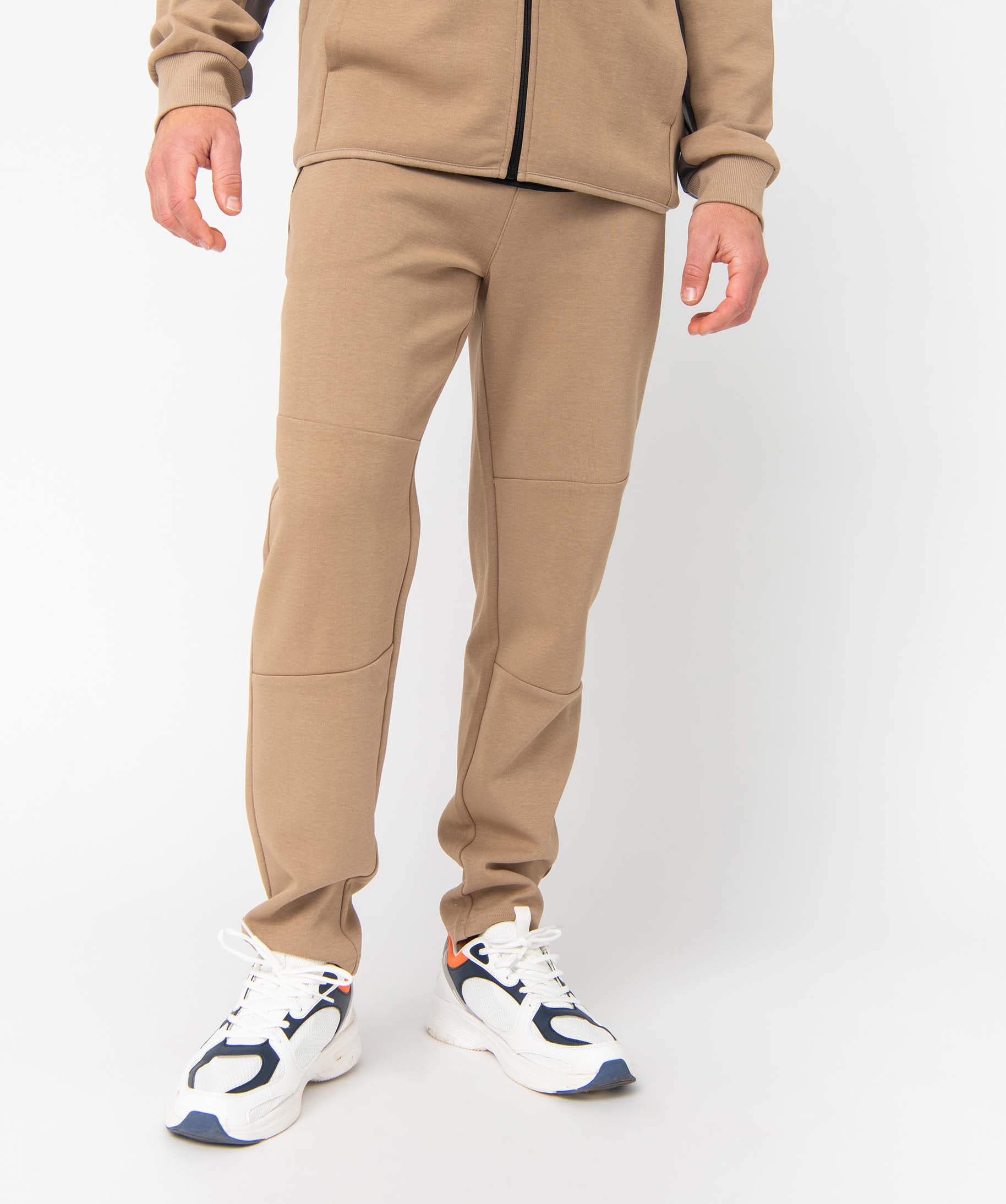 pantalon homme en maille a poches zippees et taille elastiquee beige