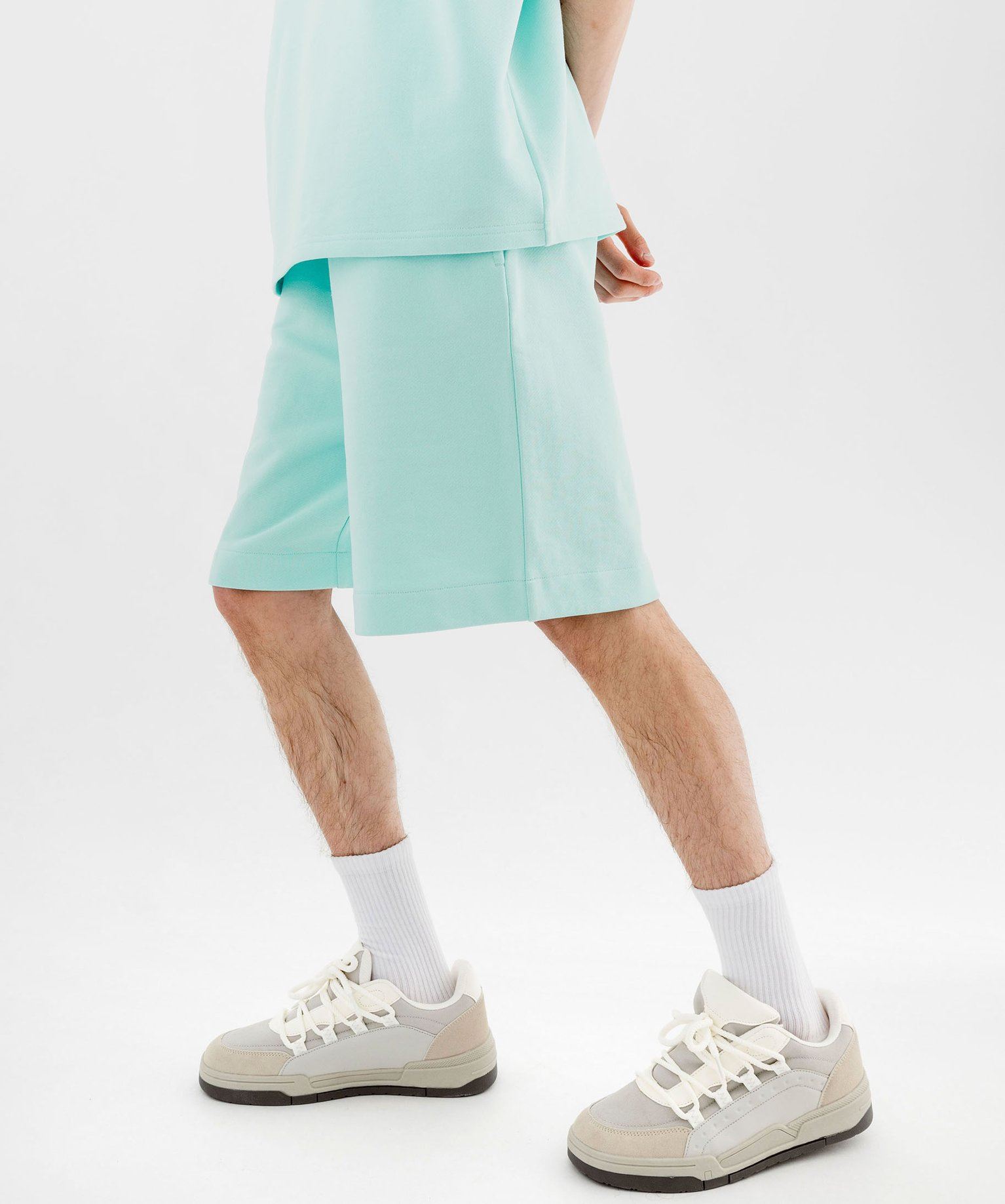 bermuda large en maille a taille elastiquee homme bleu shorts et bermudas