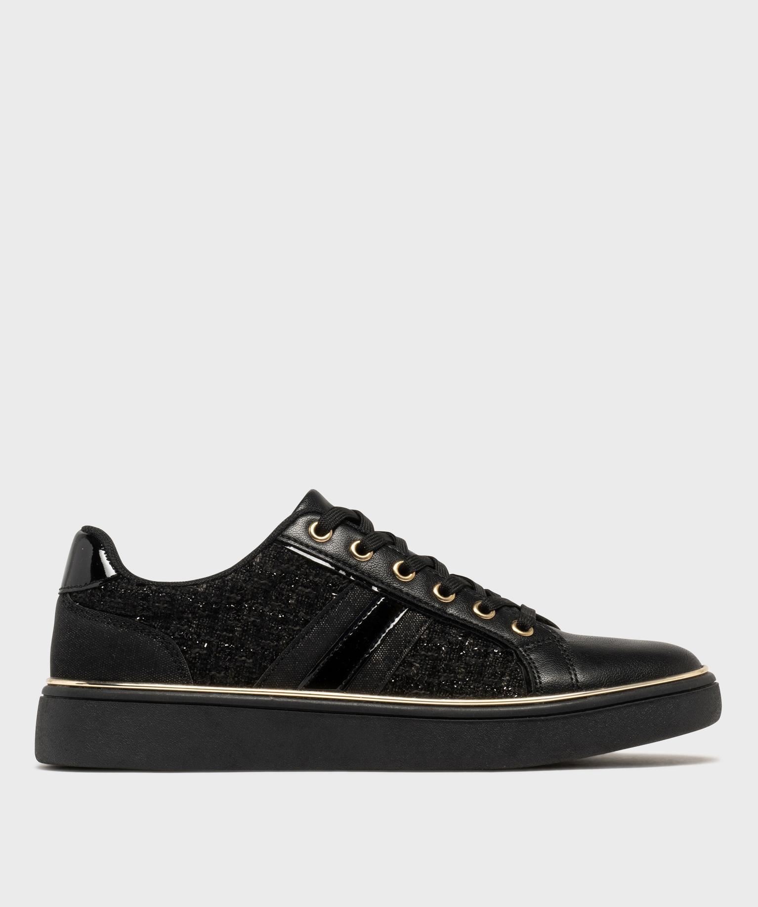 baskets basses a tige textile et details dores femme noir
