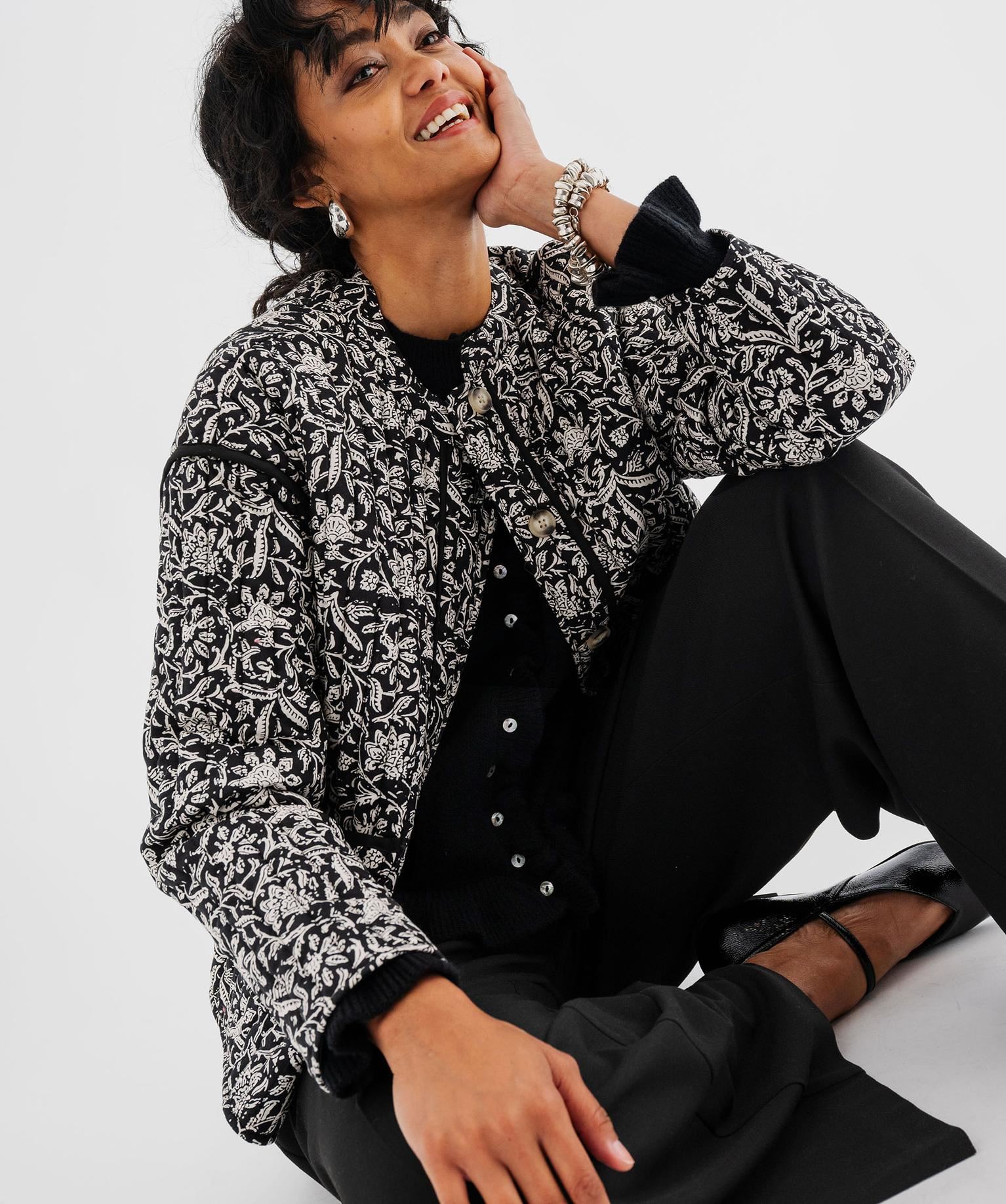 veste matelassee a col rond a motifs femme noir manteaux
